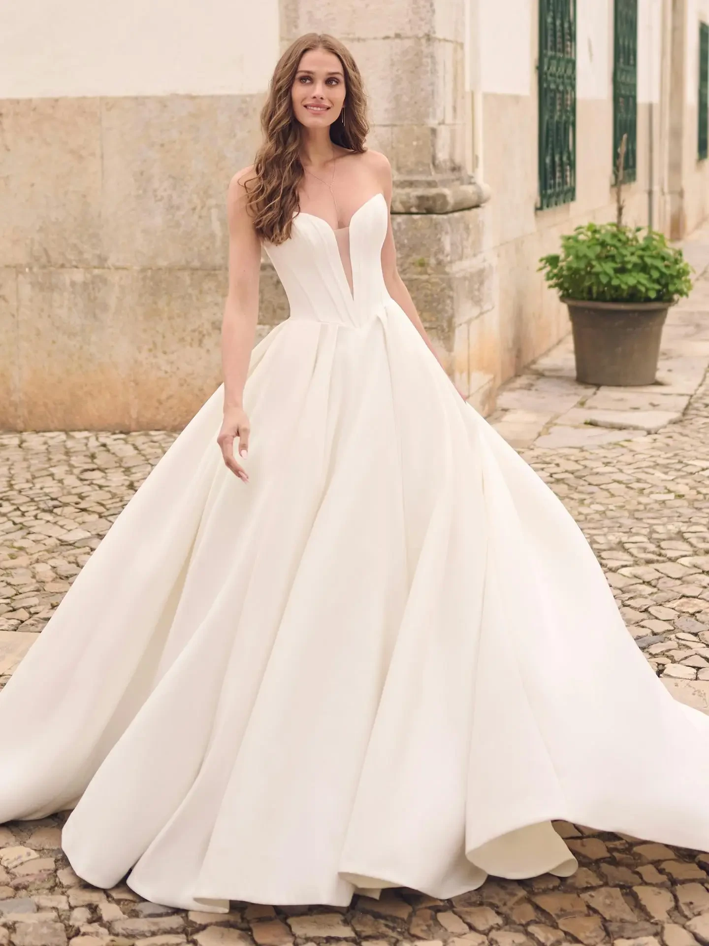 Bride wearing clean basque waist ball gown