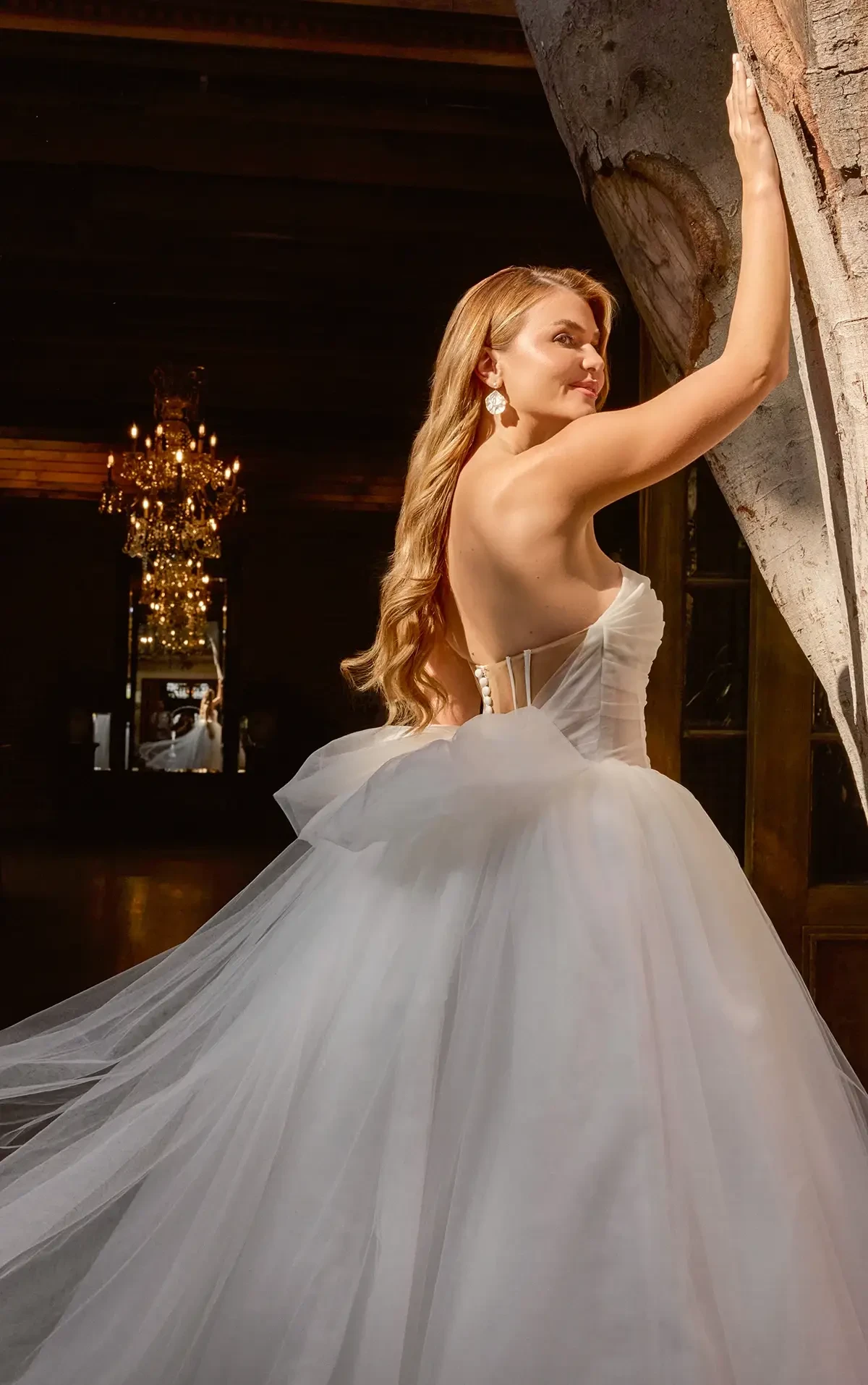 Back of wedding gown with corset back and sculpted detachable bow