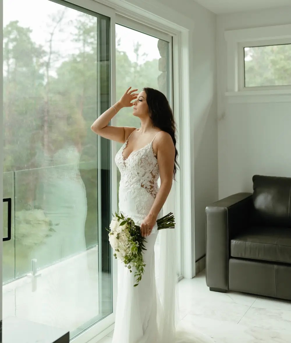 Сouple wearing a white gown and a black suit